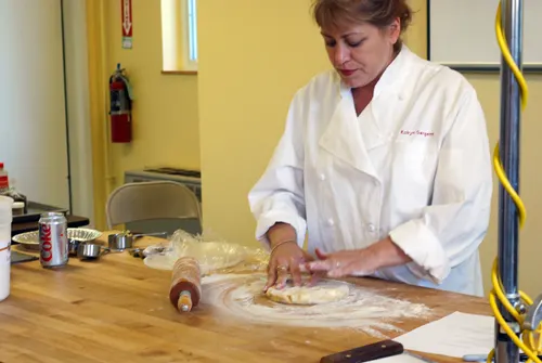 Robyn explains how to roll out pie crust. Taken at King Arthur Flour's Baking Education Center.
